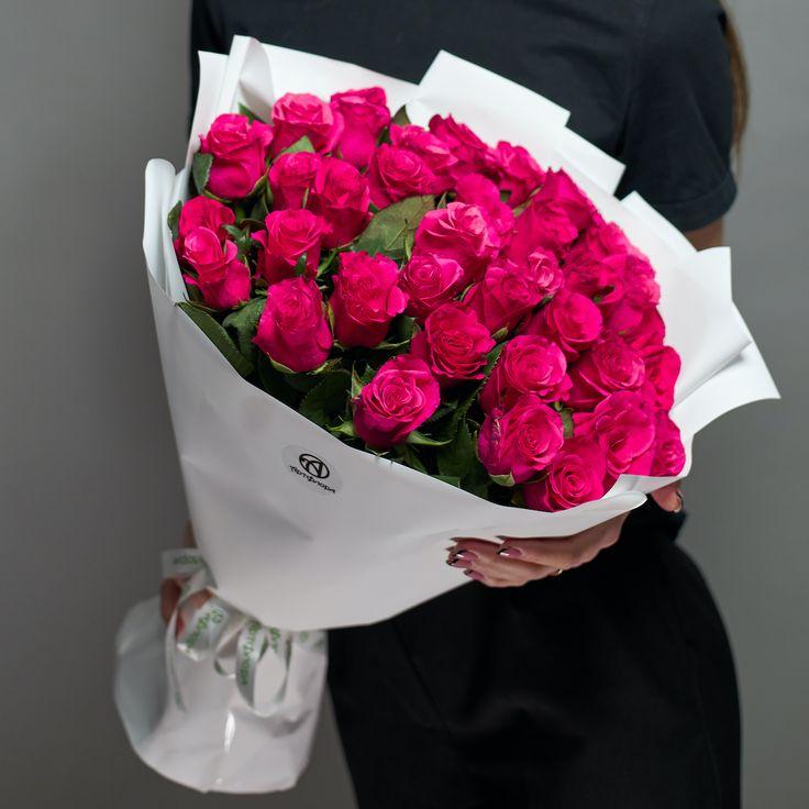 Corporate meeting room with carefully timed floral arrangements that maintain elegance throughout business hours